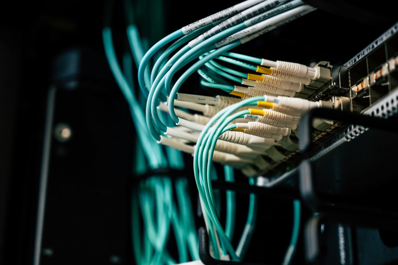 Switch installed on rack with network cables